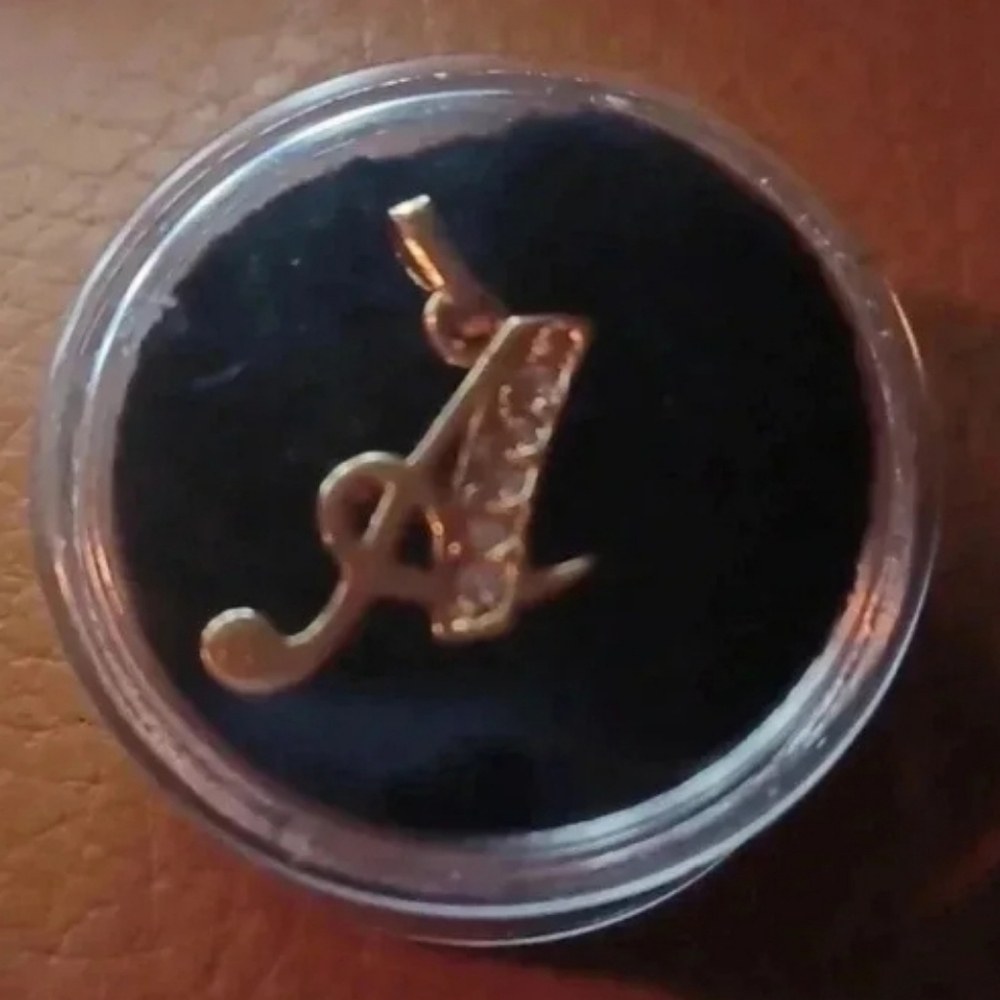 Gold plated letter pendant "A" with faux diamonds